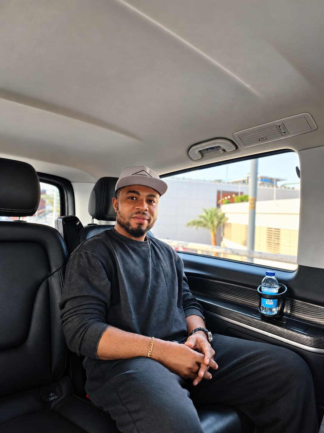 Oscar Frank sitting in a car